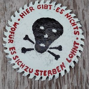 Edgy Skull and Crossbones Saw Blade Wall Art - Black and Red . Metal 7 Inch